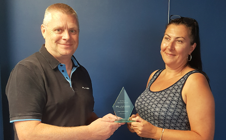 Lisa Loveridge receives 10 year service award